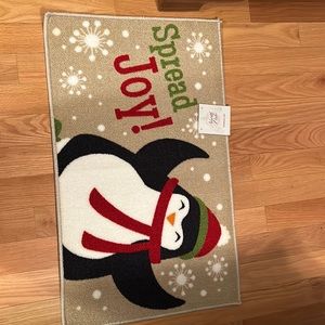 Decorate penguin spread joy holiday rug. 20 inches by 34inches .Light weight